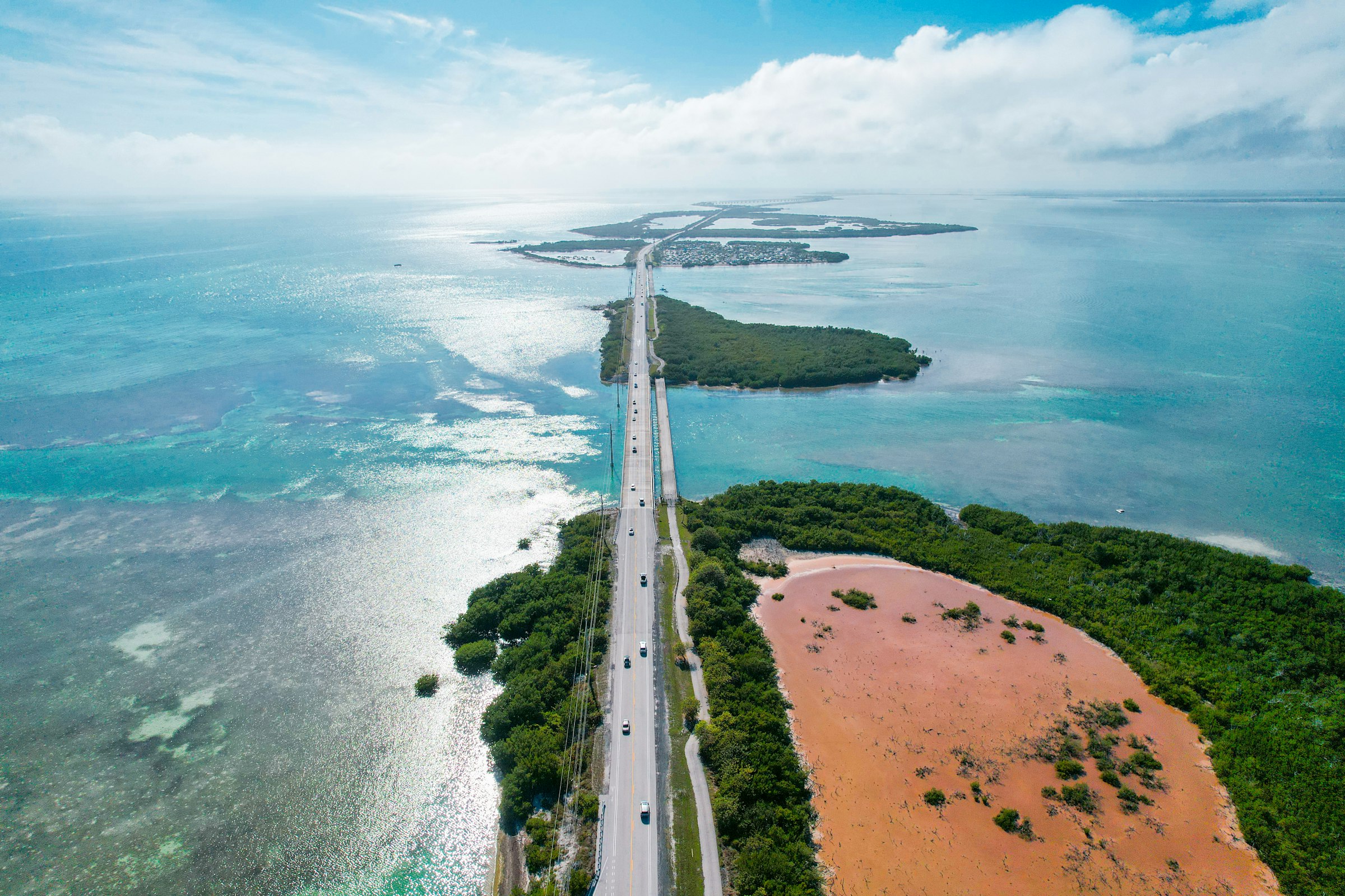 Aerial view of the Overseas Highway beside the ocean in the Florida Keys